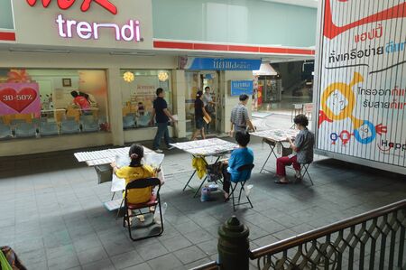 Bangkok, Thailand - February 9, 2007: Lottery retailers on sidewalk at Siam Square shopping and entertainment area in Bangkokのeditorial素材
