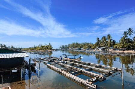 Narathiwat, Thailand - October 27, 2006: Local riverside fishery on the canal connect to the seaのeditorial素材