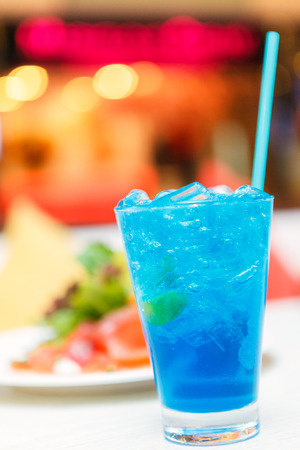blue italian soda on the white table.の写真素材