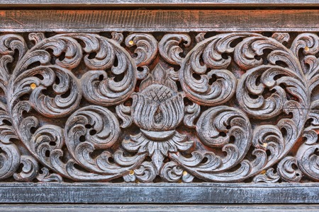 Wood carving in a thai temple.の写真素材