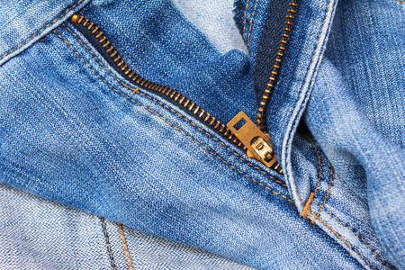 Closeup Blue jeans texture with zipper.の写真素材