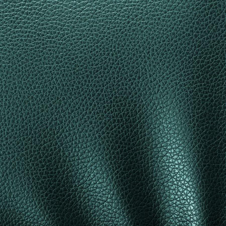 Green leather texture or leather background for design with copy space for text or image. Rough leather fabric.の写真素材