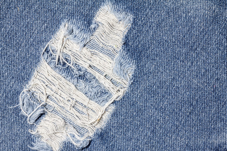 Denim jeans texture or denim jeans background with old torn of fashion jeans design with copy space...