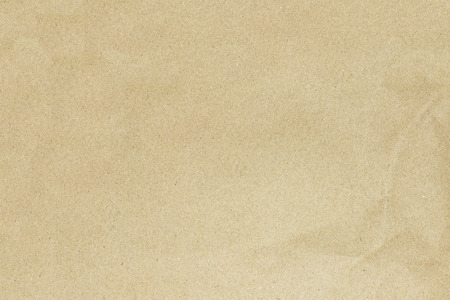 Recycled crumpled brown paper texture or paper background for design with copy space for text or image.の写真素材