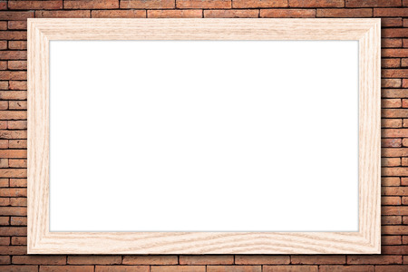 Whiteboard or Empty bulletin board with a wooden frame on brick wall background with copy space for text or image.の写真素材