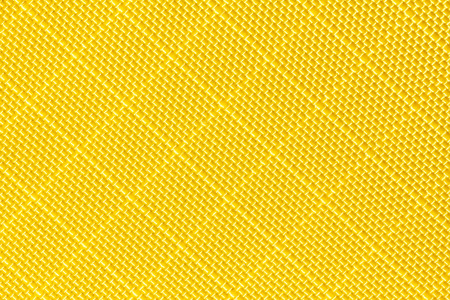 Yellow fishnet cloth material as a texture background. Nylon texture pattern or nylon background for design with copy space for text or image.の写真素材
