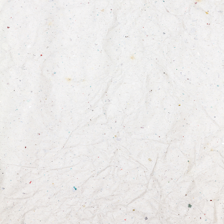 Recycled crumpled white paper texture, paper background for design with copy space for text or image.の写真素材