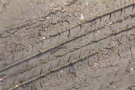 Wheel track on the soil. Track wheel on the ground.の写真素材