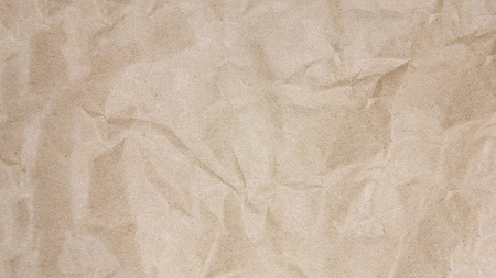 Recycled crumpled brown paper texture background for business education and communication concept design.の写真素材