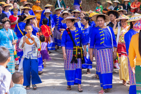 Thoet Thai, Chiang Rai - THAILAND, December 12, 2018 : Group of Shan or Tai Yai (ethnic group living in parts of Myanmar and Thailand) in tribal dress do native dancing in Shan New Year celebrations.のeditorial素材