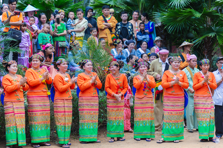 Thoet Thai, Chiang Rai - THAILAND, December 12, 2018 : Group of Shan or Tai Yai (ethnic group living in parts of Myanmar and Thailand) in tribal dress do native dancing in Shan New Year celebrations.のeditorial素材