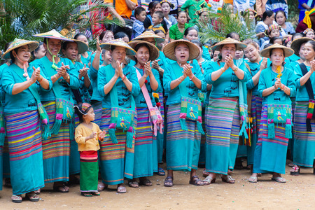 Thoet Thai, Chiang Rai - THAILAND, December 12, 2018 : Group of Shan or Tai Yai (ethnic group living in parts of Myanmar and Thailand) in tribal dress do native dancing in Shan New Year celebrations.のeditorial素材