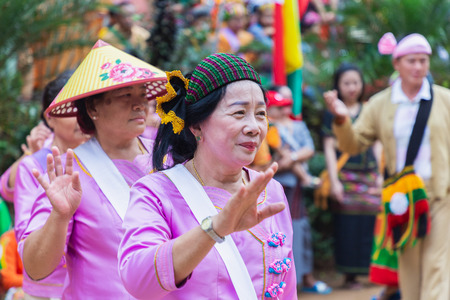 Thoet Thai, Chiang Rai - THAILAND, December 12, 2018 : Group of Shan or Tai Yai (ethnic group living in parts of Myanmar and Thailand) in tribal dress do native dancing in Shan New Year celebrations.のeditorial素材