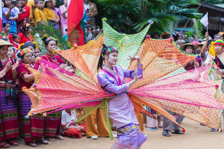 Thoet Thai, Chiang Rai - THAILAND, December 12, 2018 : Group of Shan or Tai Yai (ethnic group living in parts of Myanmar and Thailand) in tribal dress do native dancing in Shan New Year celebrations.のeditorial素材