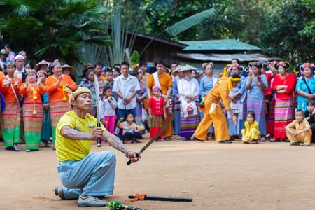 Thoet Thai, Chiang Rai - THAILAND, December 12, 2018 : Group of Shan or Tai Yai (ethnic group living in parts of Myanmar and Thailand) in tribal dress do native dancing in Shan New Year celebrations.のeditorial素材