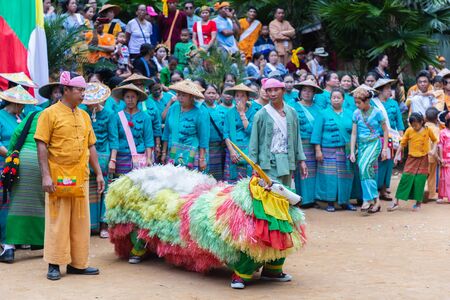 Thoet Thai, Chiang Rai - THAILAND, December 12, 2018 : Group of Shan or Tai Yai (ethnic group living in parts of Myanmar and Thailand) in tribal dress do native dancing in Shan New Year celebrations.のeditorial素材