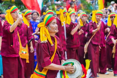 Thoet Thai, Chiang Rai - THAILAND, December 12, 2018 : Group of Shan or Tai Yai (ethnic group living in parts of Myanmar and Thailand) in tribal dress do native dancing in Shan New Year celebrations.のeditorial素材