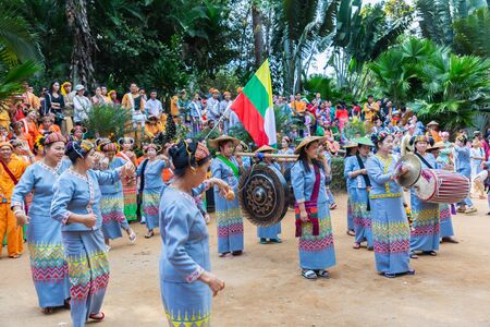 Thoet Thai, Chiang Rai - THAILAND, December 12, 2018 : Group of Shan or Tai Yai (ethnic group living in parts of Myanmar and Thailand) in tribal dress do native dancing in Shan New Year celebrations.のeditorial素材