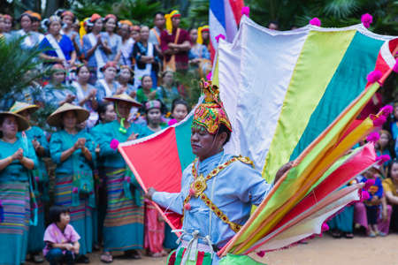 Thoet Thai, Chiang Rai - THAILAND, December 12, 2018 : Group of Shan or Tai Yai (ethnic group living in parts of Myanmar and Thailand) in tribal dress do native dancing in Shan New Year celebrations.のeditorial素材