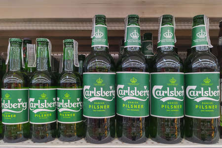 Chiang Mai - THAILAND, June 10, 2020 : Carlsberg beer bottles selling on shelf in supermarket at Chiang Mai. Thailand.のeditorial素材