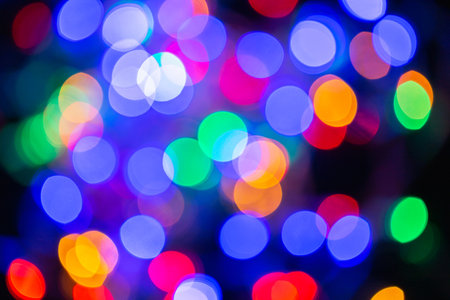 Abstract background with bokeh defocused lightsの写真素材