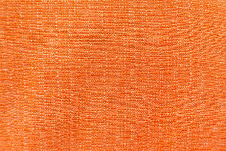 Orange fabric cloth background texture for designの写真素材