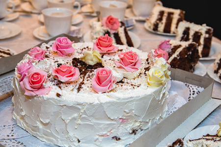 Cake at a shallow depth of field with slices in the backgroundの写真素材
