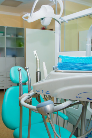 Dental office with a special chair and a lamp for inspectionの写真素材