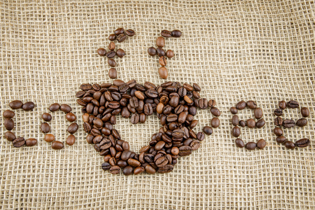 drawing on sackcloth made up of coffee beansの写真素材