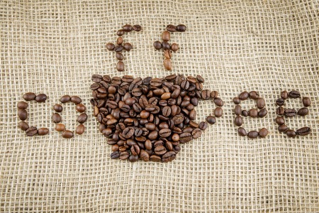 drawing on sackcloth made up of coffee beansの写真素材