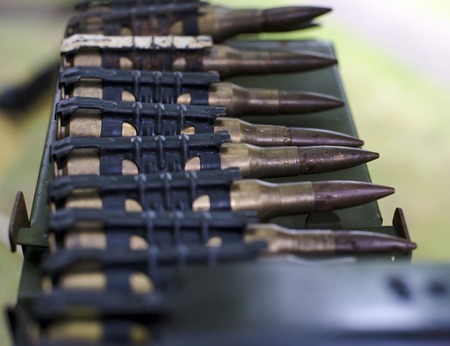 cartridges in cartridge belts with shallow depth of fieldの写真素材