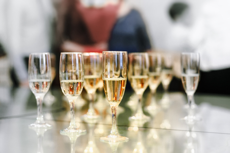 Glasses of champagne on the tableの写真素材