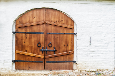 wooden gates closed on the boltの写真素材