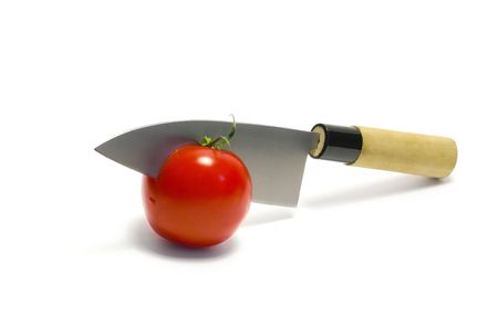 Japanese deba knife cutting red tomato の写真素材