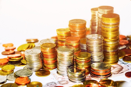 Business growth concept money coins on white background.の写真素材