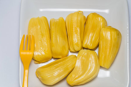 Tropical fruit Jackfruit on white plate with pork