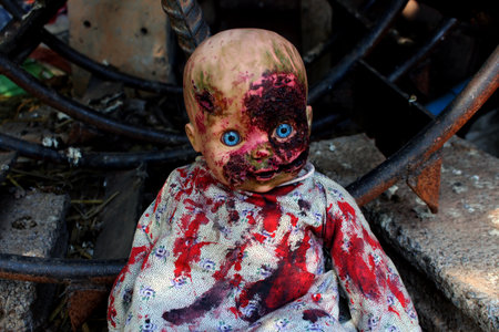 Creepy doll with blood on his face, halloweenの写真素材