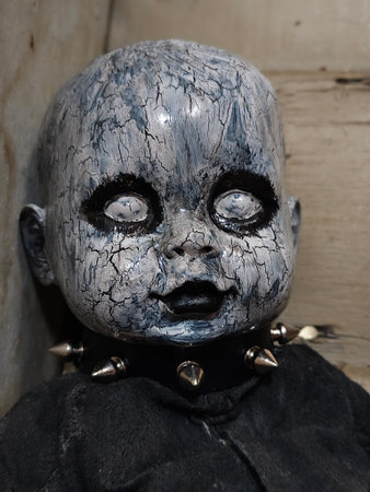 scary halloween theme with doll face in black and whiteの写真素材