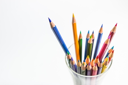color pencils in cup on white backgroundの写真素材