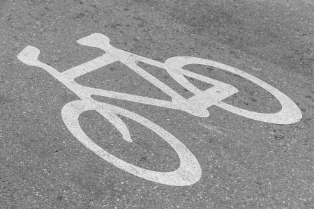 bike lane and bike symbol on streetの写真素材