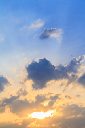 sunrise with clouds light raysの写真素材