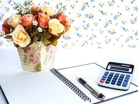 decolate flower and business object on tableの写真素材