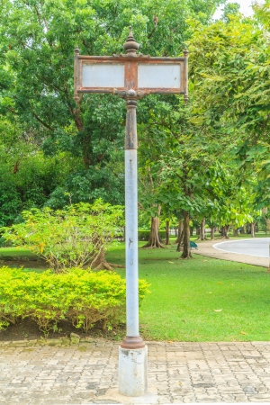 old guide post in parkの写真素材
