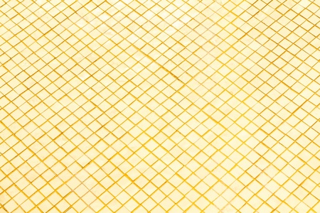 close up gold plate d background.の写真素材