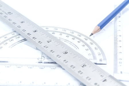 transparent plastic and aluminium rulers isolated on white