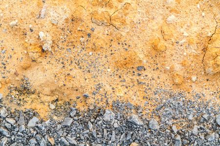 rock and yellow sand backgroundの写真素材
