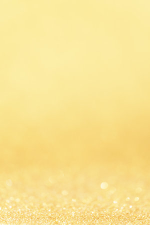christmas golden bright glowlight shine effect glitter texture blurred bokeh abstract  background.holiday xmas and happy new year backdrop concept,luxury celebration, invitation greeting  wallpaper.の写真素材