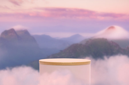 Surreal podium outdoors on sky pink pastel soft cloud with misty mountain nature landscape background.Beauty cosmetic product placement pedestal present minimal display,summer paradise dreamy concept.の写真素材