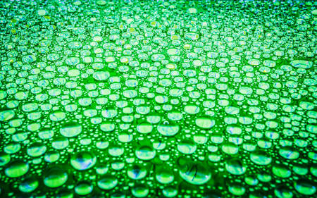 Water drop on glass background の写真素材