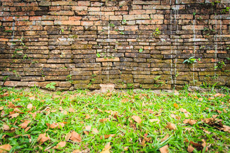 Background of red brick wall pattern texture in old city of Thailandの写真素材